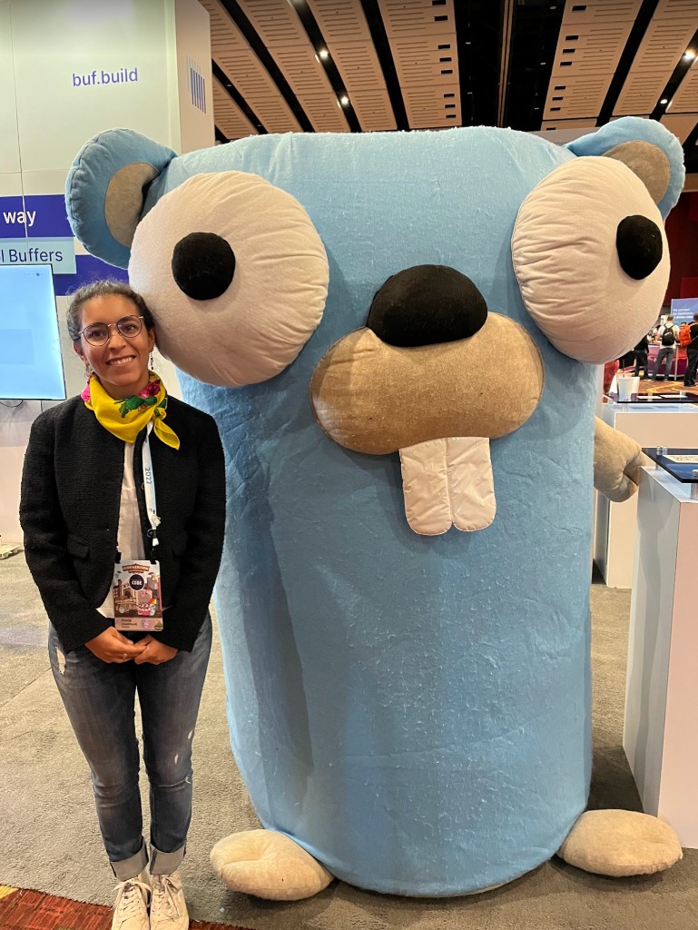 Donia with the giant Gopher at GopherCon